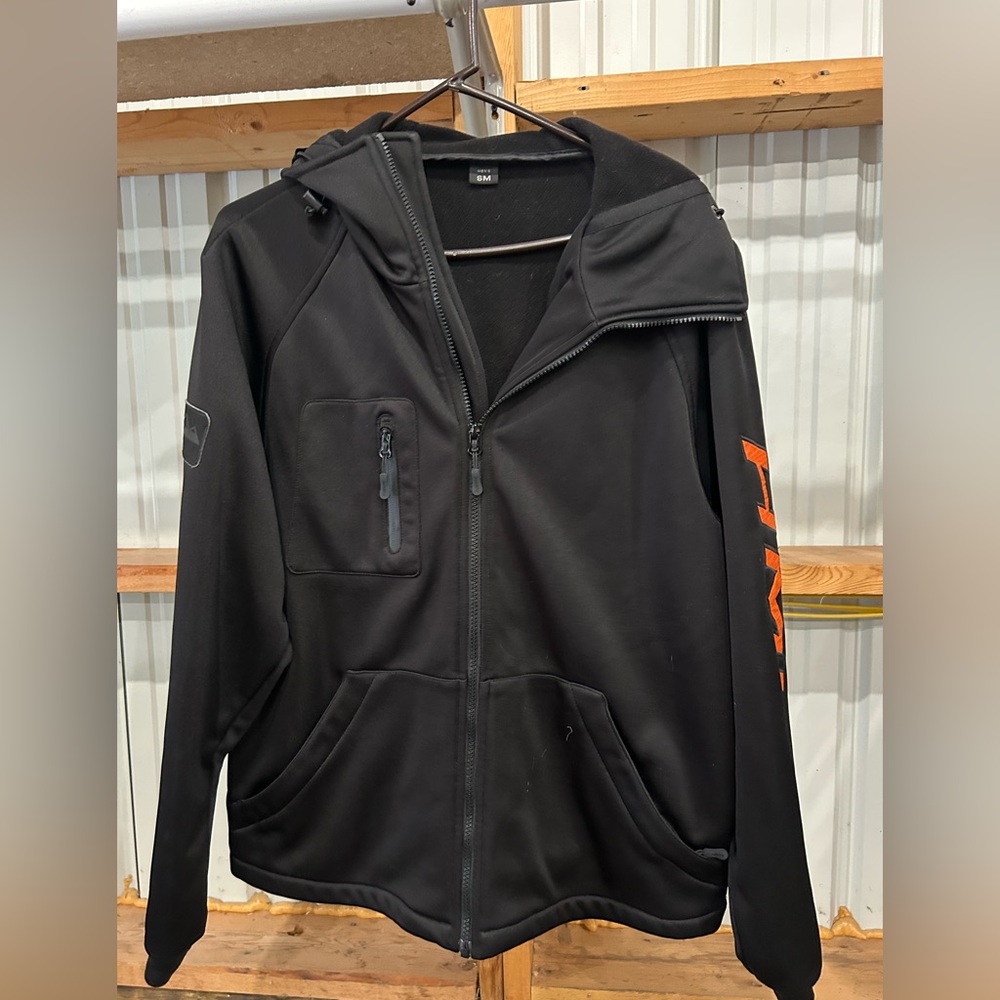 HMK Black with Orange print Zip-Up ski/snowmobile Jacket. Men’s size small